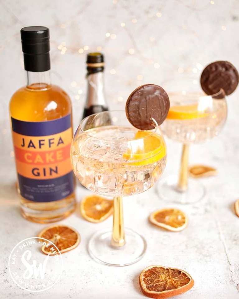 a bottle of alcohol and a glass of alcohol