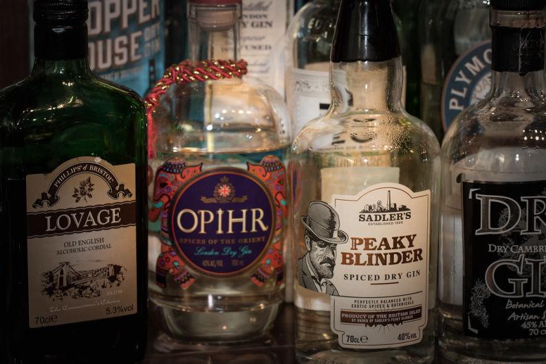 a group of bottles with labels